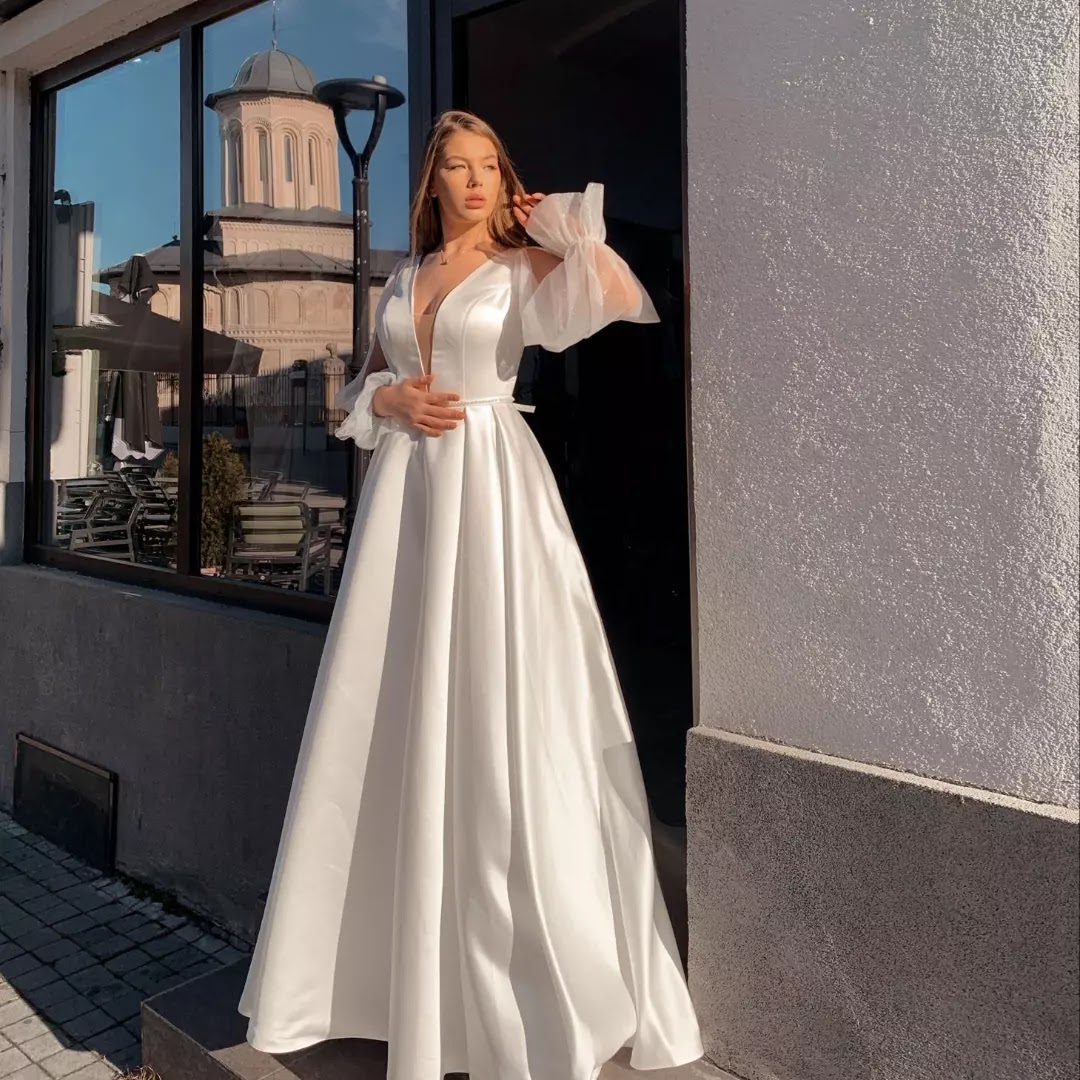 Rochii de mireasă si rochii de ocazie Amnezia Fashion